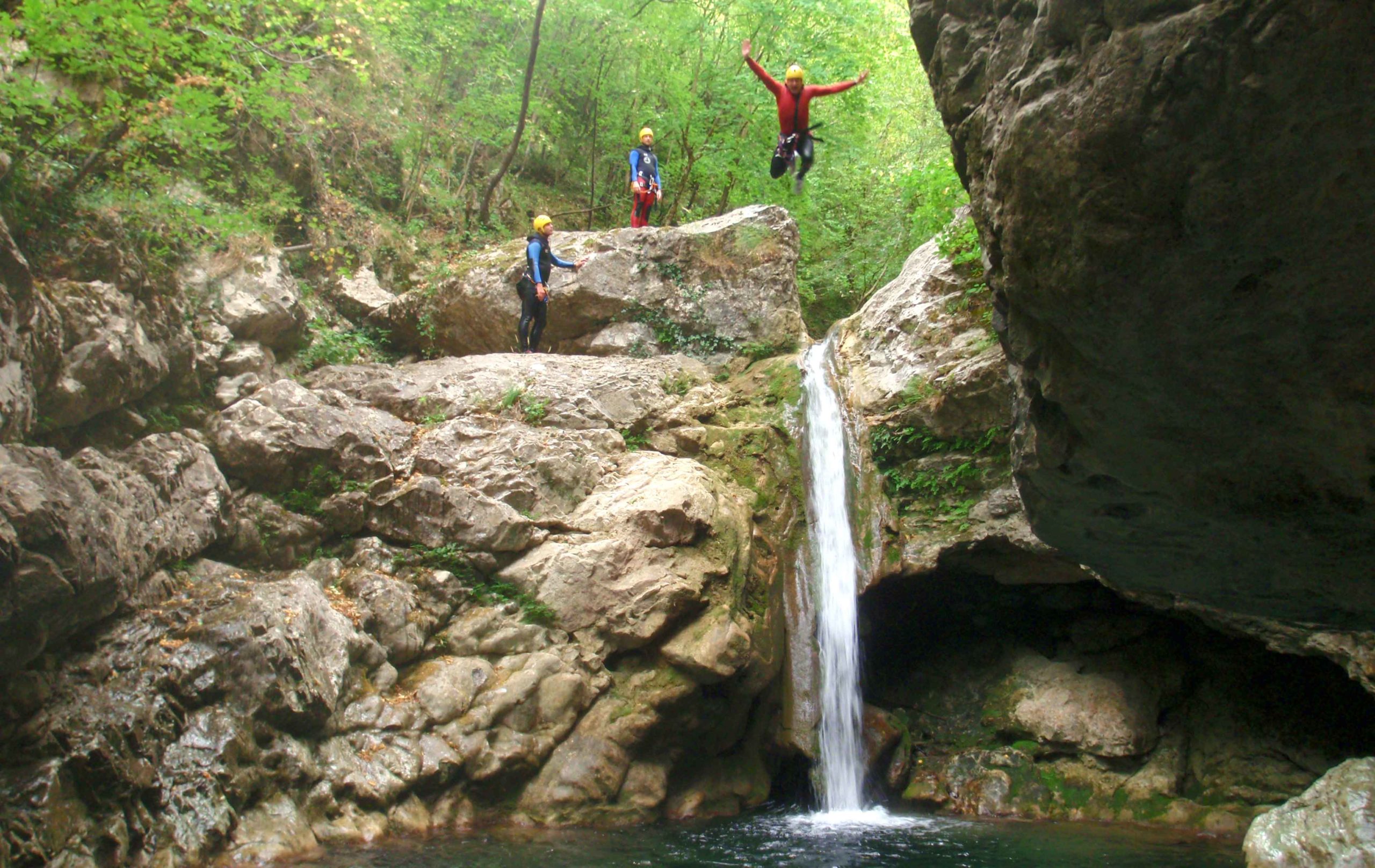 Canyon Forest - An adventurer who jumps a small waterfall to land in a cauldron